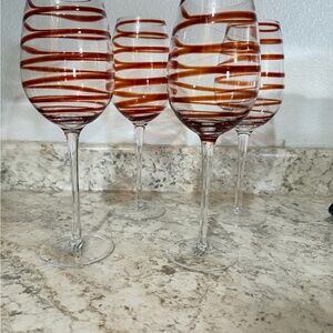 Retired Pier 1 Red swirl line 10” tall wine glasses set of 4